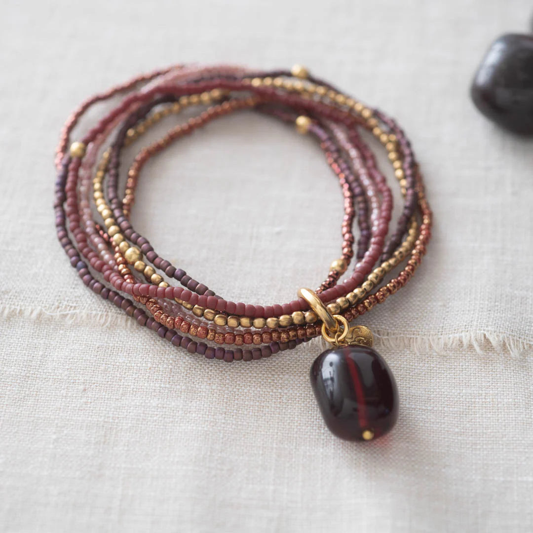 NIRMALA GARNET GOLD COLOURED BRACELET
