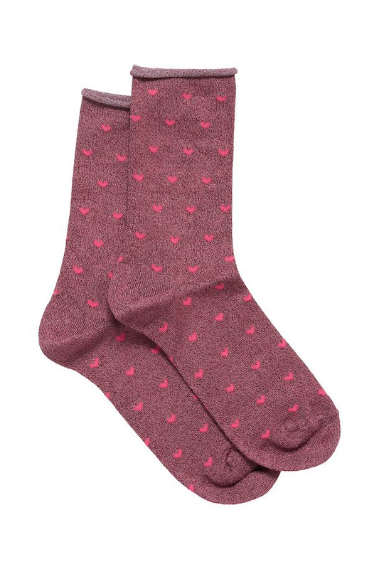 Patterned sock

Glitter at the top, toe and heel
Composition : 54% Viscose, 35% Polyamide, 9% Polyester, 2% Elastane
Colour: Vivacious Mix
The Beach House Boutique, Rock, Cornwall. 