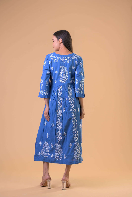 Fit: Regular
Length: Knee
Composition: 100% cotton
Colour: Blue
Above the ankle length dress and long length sleeves. Covered in a floral geometric pattern and is a pastel blue colour. V shape neck line. 
The Beach House Boutique, Rock, Cornwall.