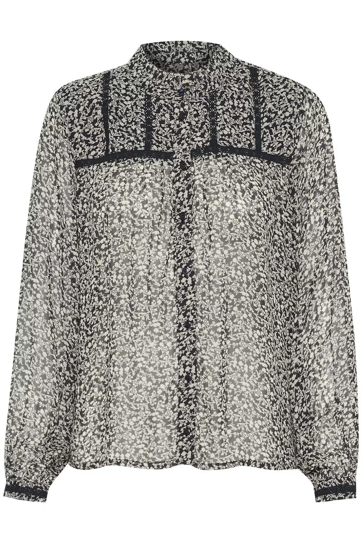 Create a refined look with this blouse in a light and airy material. The beautiful print in neutral tones is combined with delicate details such as a high neck, button closure, and feminine cuffs. Perfect for both everyday wear and special occasions.


Fit: Regular fit

Composition : 100% Viscose

Colour: Navy Micro Flower

The Beach House Boutique, Rock, Cornwall. 