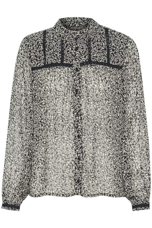 Create a refined look with this blouse in a light and airy material. The beautiful print in neutral tones is combined with delicate details such as a high neck, button closure, and feminine cuffs. Perfect for both everyday wear and special occasions.


Fit: Regular fit

Composition : 100% Viscose

Colour: Navy Micro Flower

The Beach House Boutique, Rock, Cornwall. 