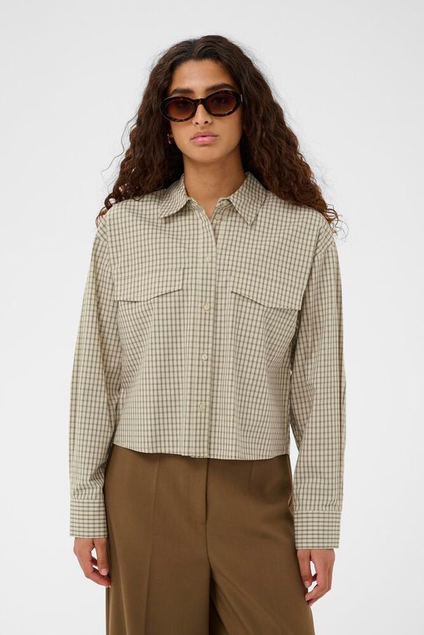 Woman's checkered short boxy style with long sleeves Sivah shirt The Beach House Rock Cornwall boutique