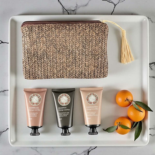 A beautiful textured pouch with waterproof liner filled with coordinating minis. Perfect for a night a weekend away or as a gift 